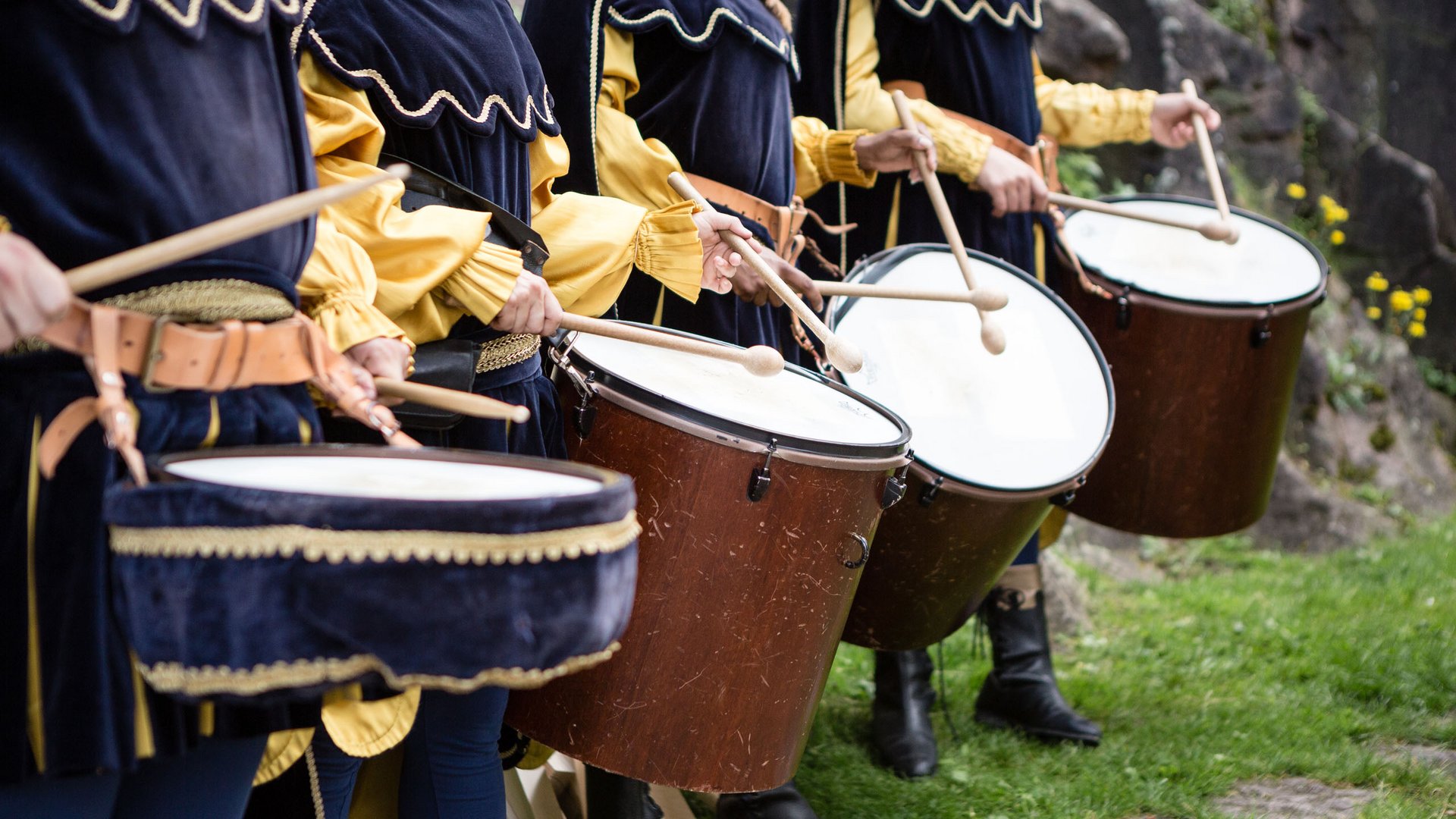 Hotels on Lago di Monticolo: South Tyrol awaits People in historic costumes playing drums outdoors
