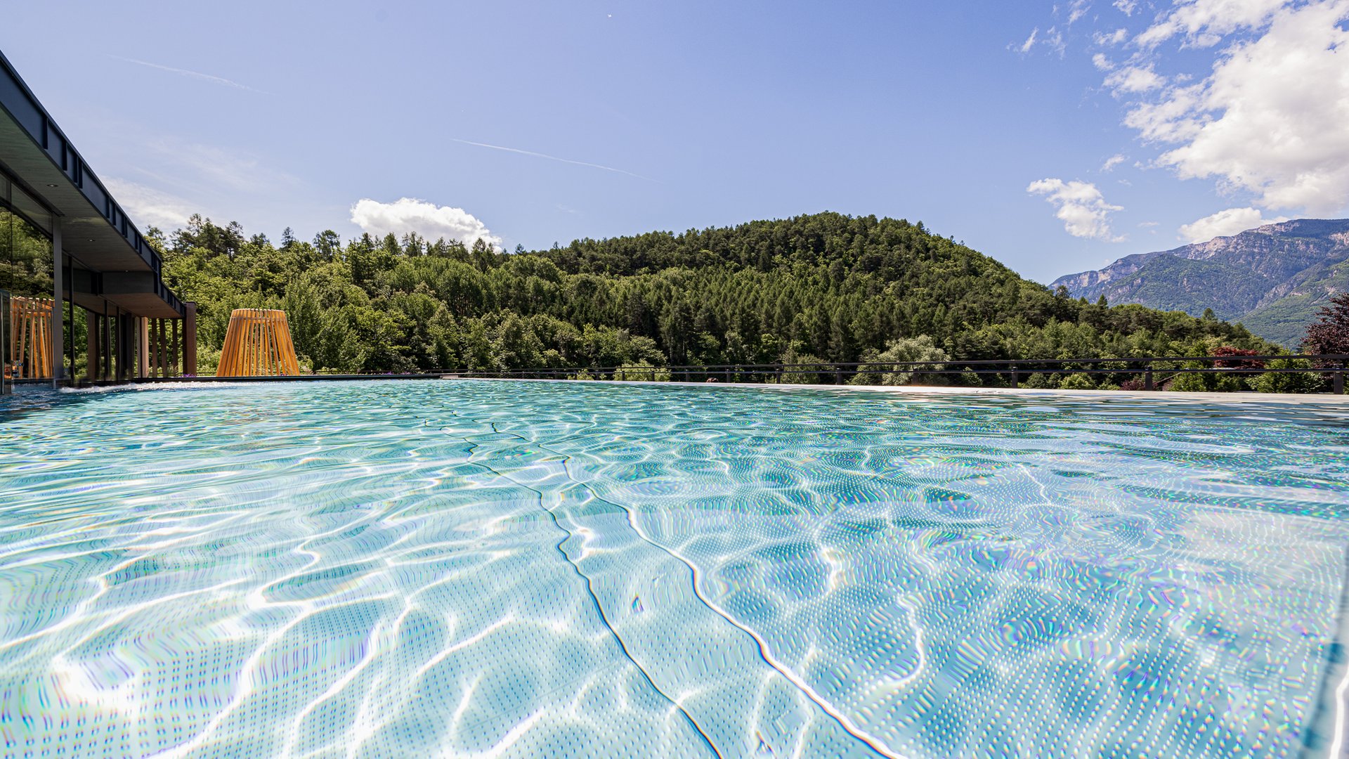 Holidays in South Tyrol at a hotel with pool by the lake